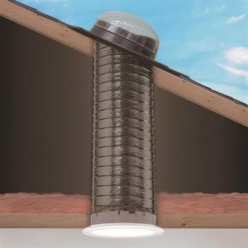 Cutaway of a tubular skylight: the roof dome, the reflective tube through the attic, and the ceiling diffuser below
